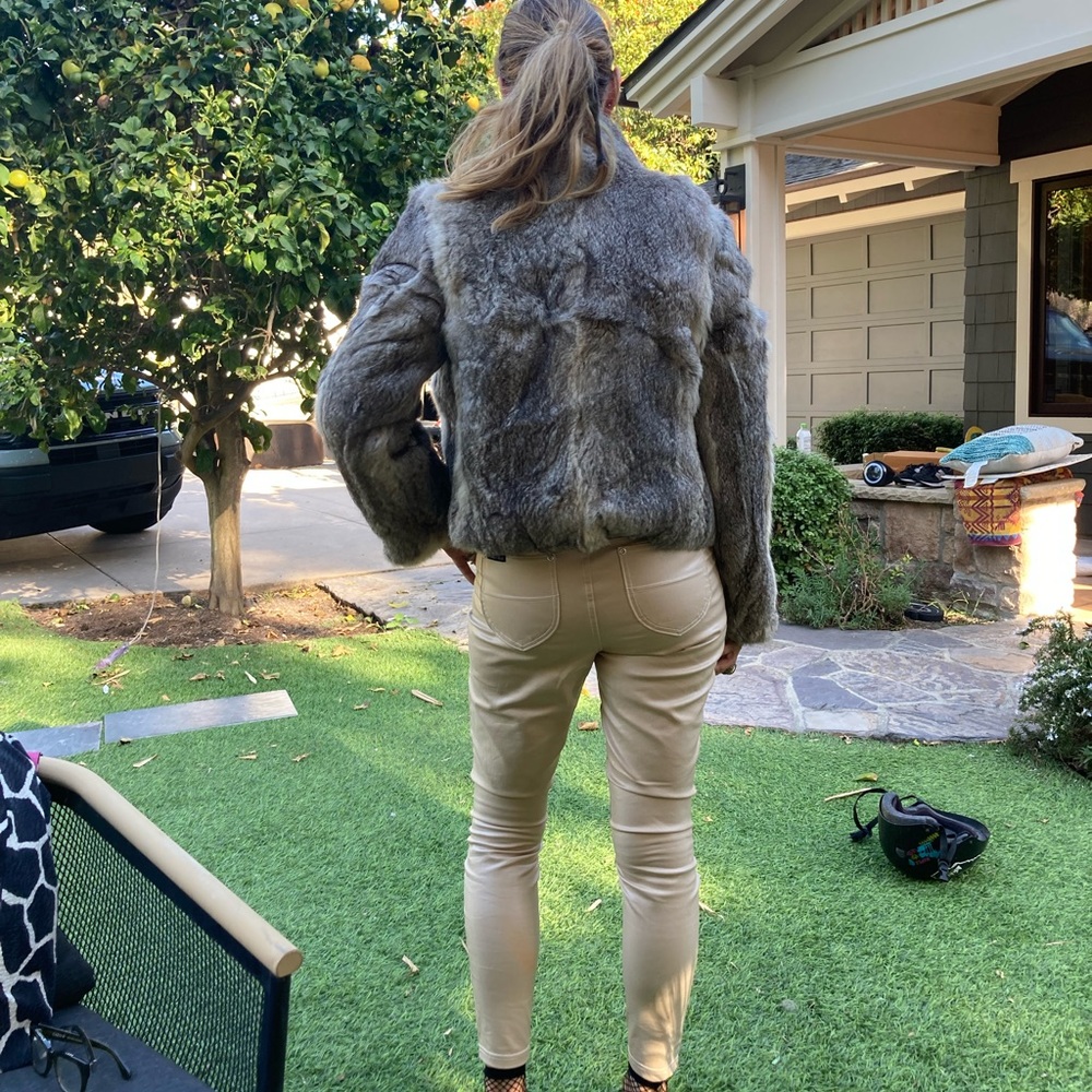 Medium faux fur jacket. Looks real and is so soft.